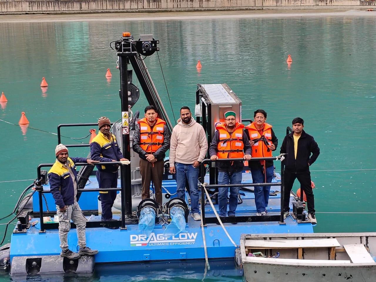 Basmni project team on-site at a reservoir installation